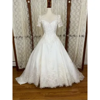 Photo of Gorgeous Vintage 90s Michaelangelo Ballgown Wedding Gown
