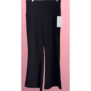 Photo of Athleta Salutation Stash Rib Flare Pants Black Large Petite NWT