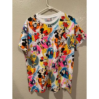 Photo of NWT Disney Parks World AOP Faux Stickers Vintage 50th Anniversary Tee M