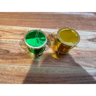 Photo of vintage plastic toy drum Christmas ornaments shiny metallic green yellow x2 80s