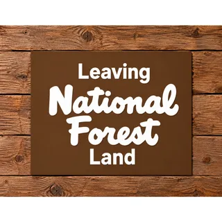 Photo of LEAVING National Forest Land Road Sign National Park NPS Hike Trail Camp