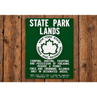Photo of New York State Park Lands Sign Parks and Recreation Camp Hunt Trap Firearms Swim