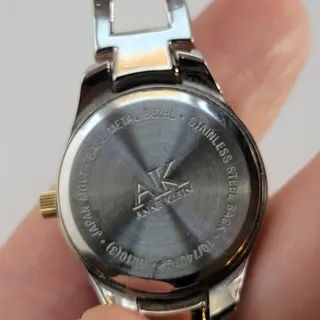 Photo of Vintage Anne Klein Womens Watch Silver Dial Gold Bezel Silver Bangle Quartz