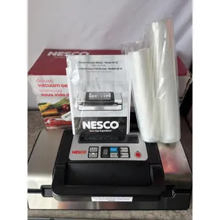Photo of Nesco Deluxe Food VS-12 Vacuum Sealer, Kit Bags & Viewing Lid, Compact, Silver